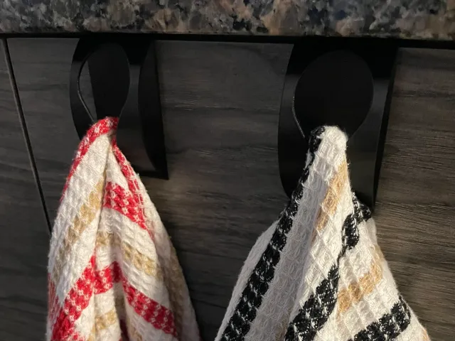 Cabinet door towel hook