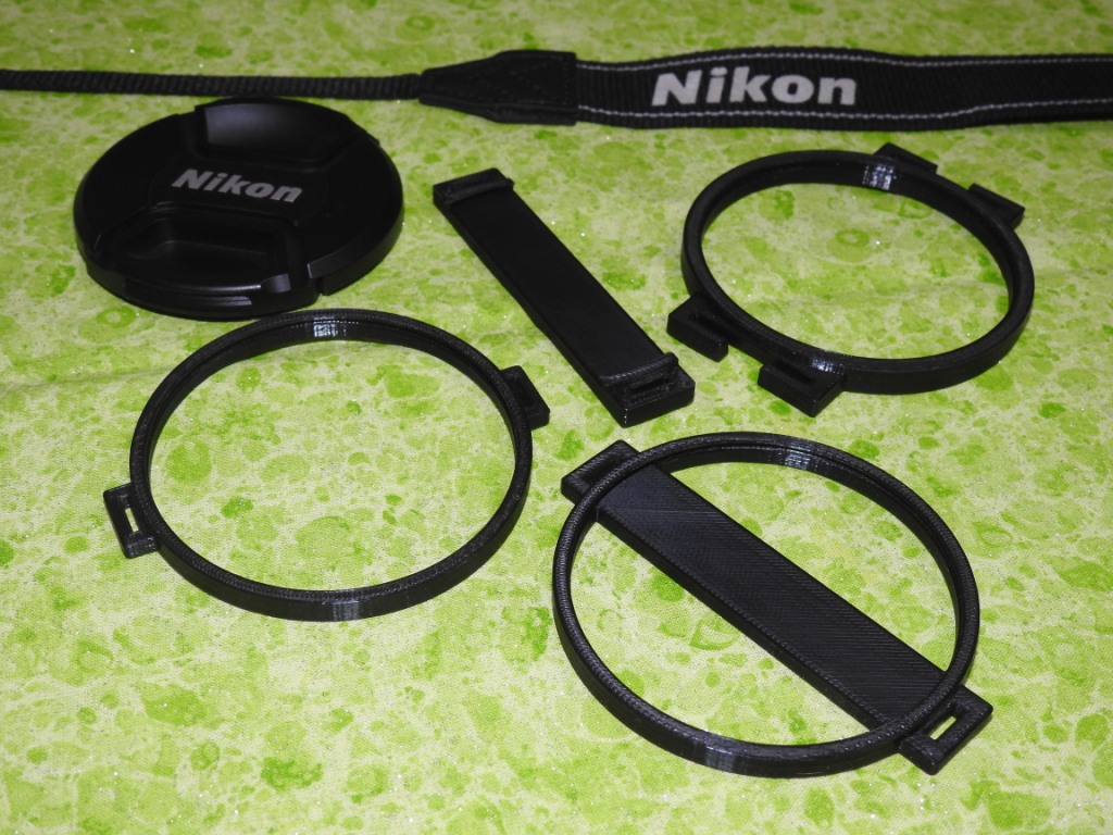 Miniatura 2 do modelo 3D Lens Cap Holder Generator