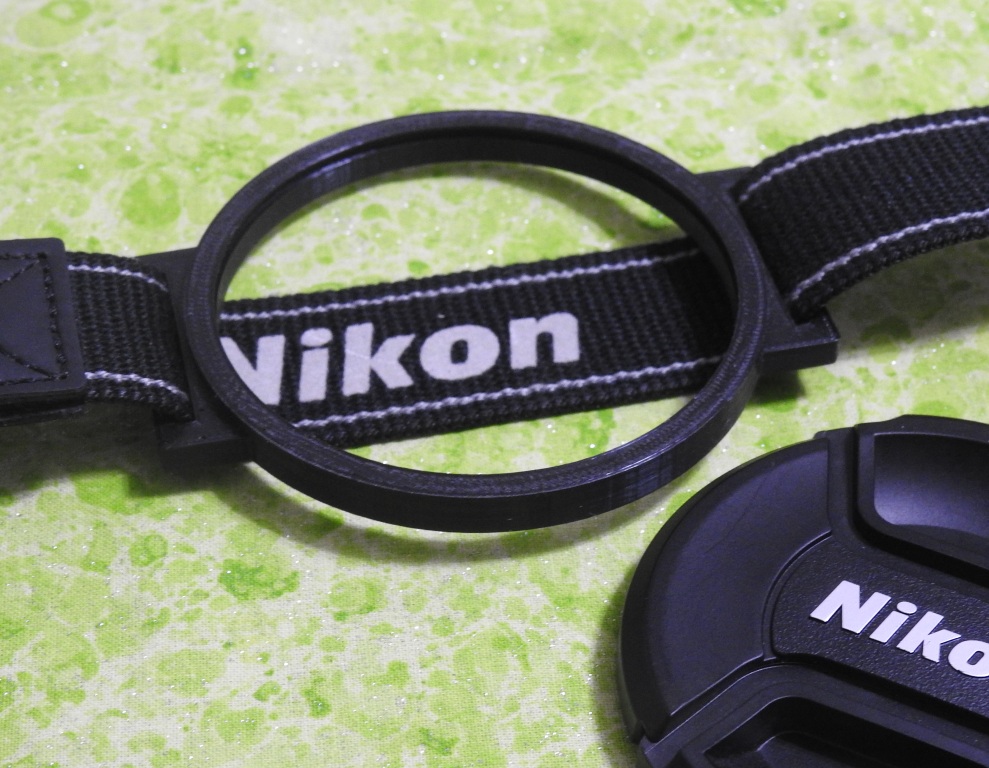 Miniatura 14 do modelo 3D Lens Cap Holder Generator