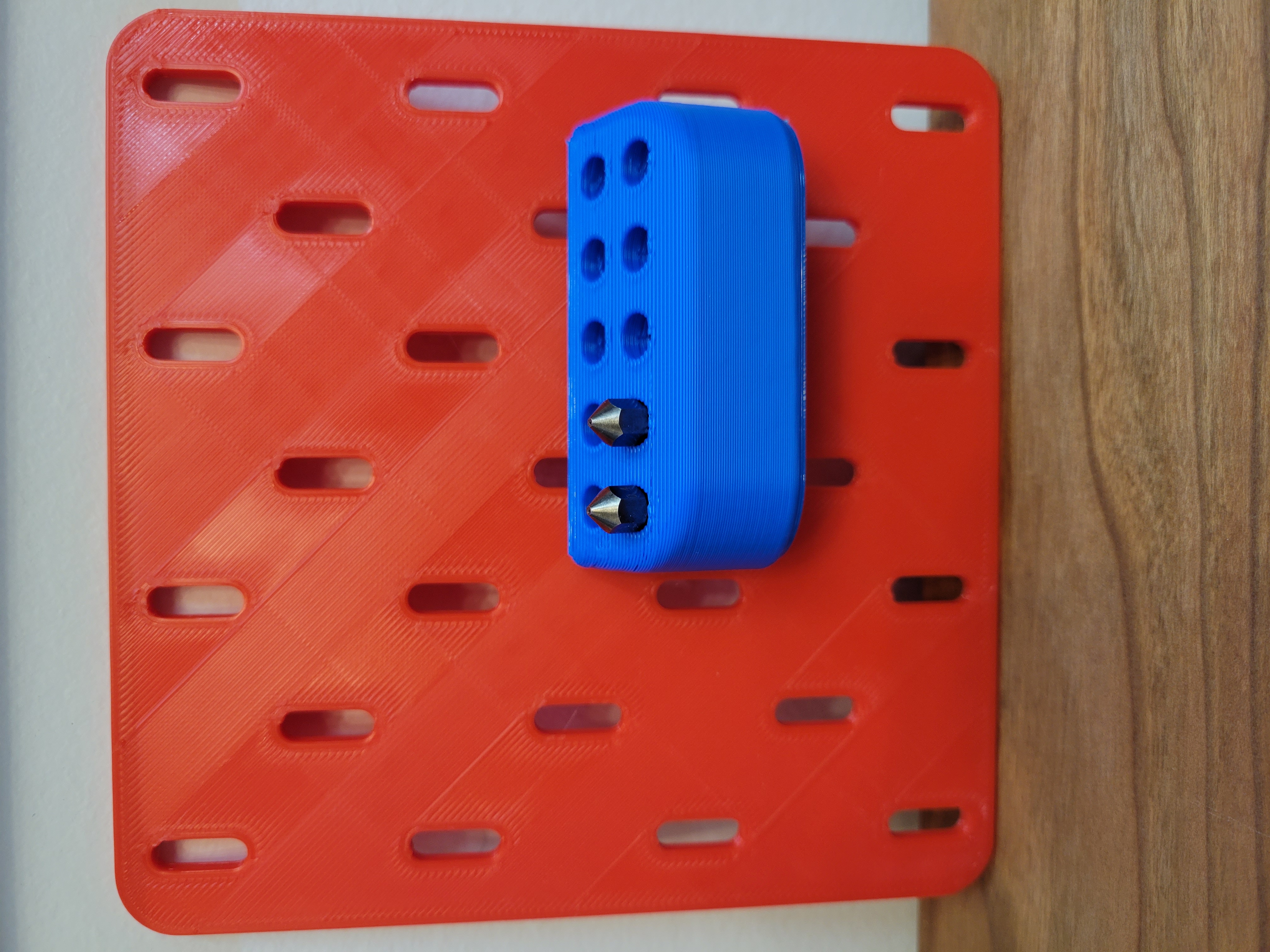 Nozzle holder for Pegboard