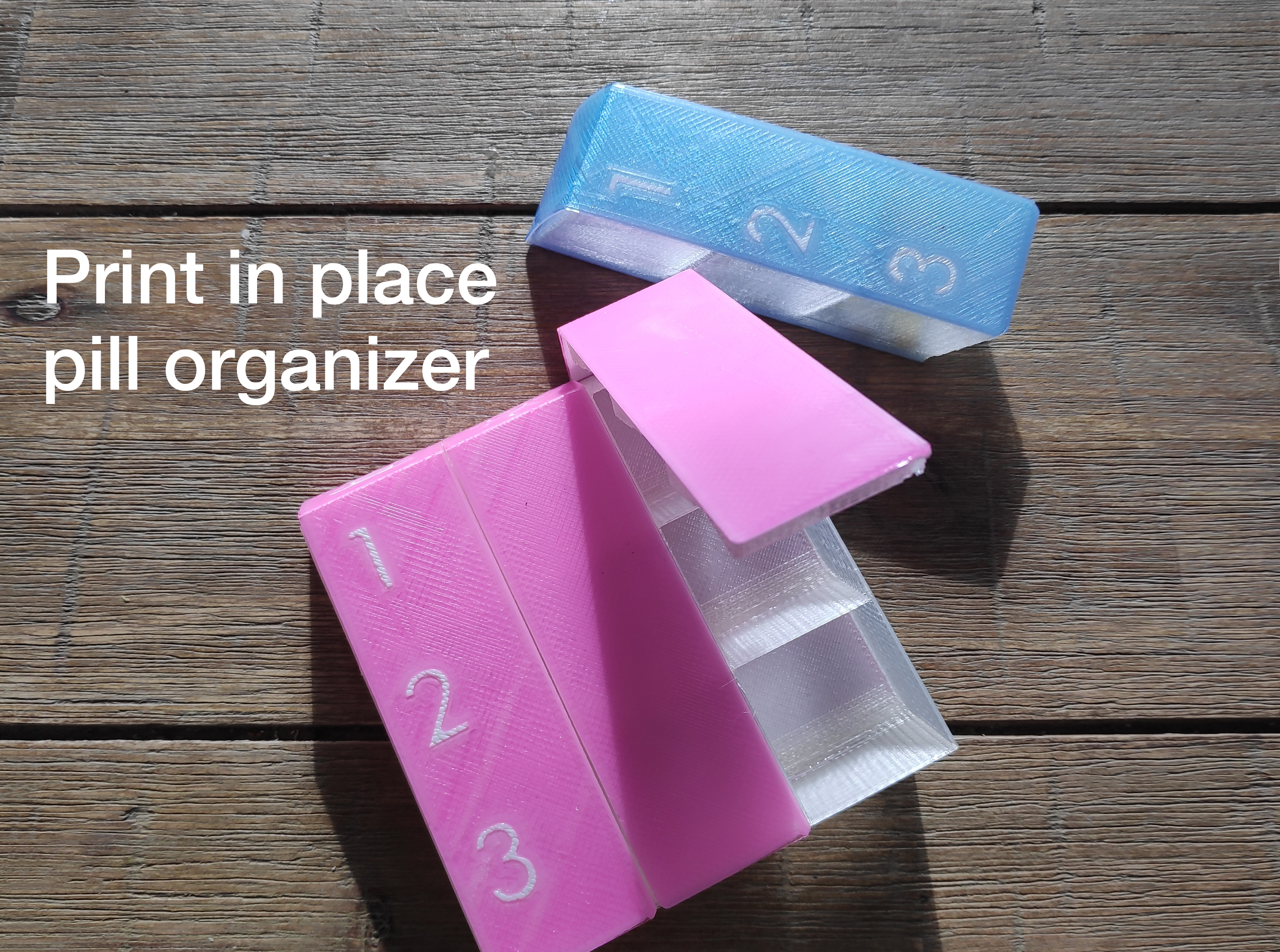 A simple pill organizer. Print in place.