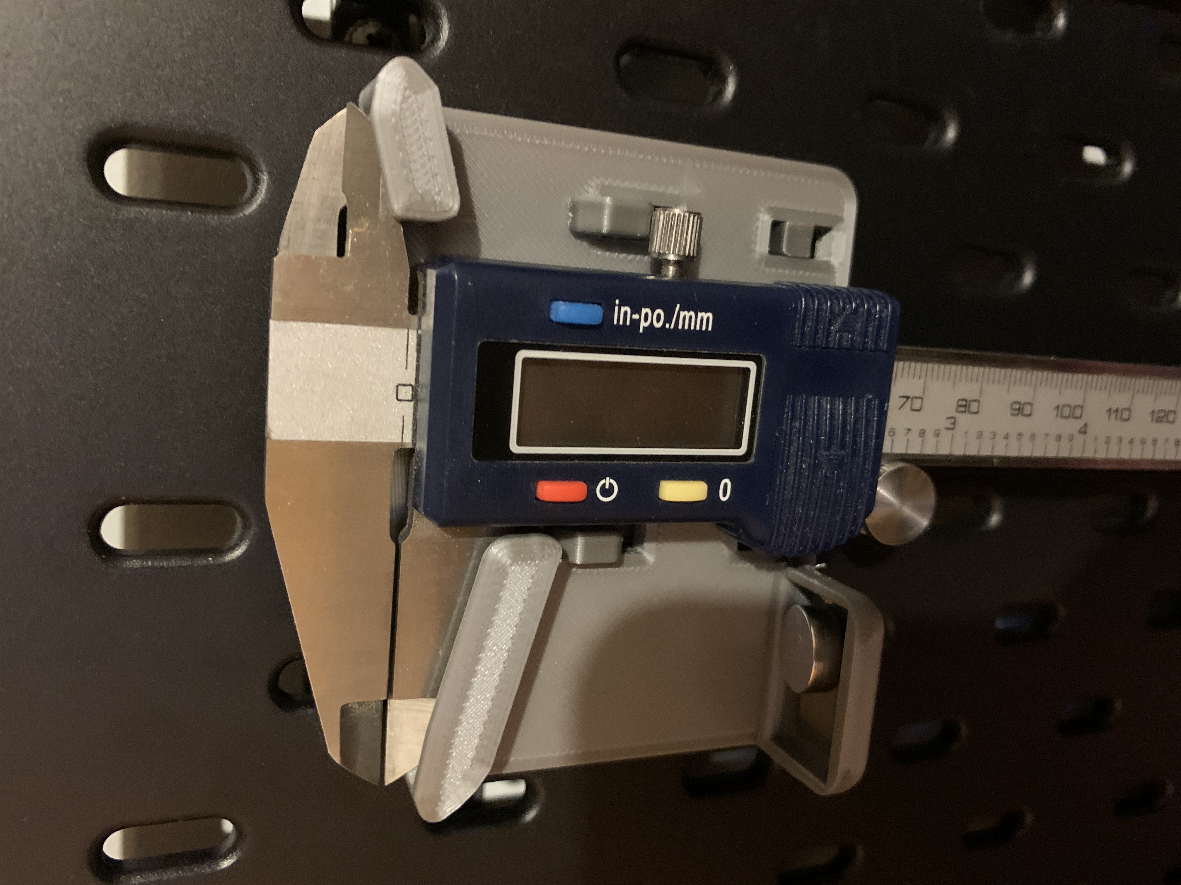 SKADIS caliper holder with battery shelf