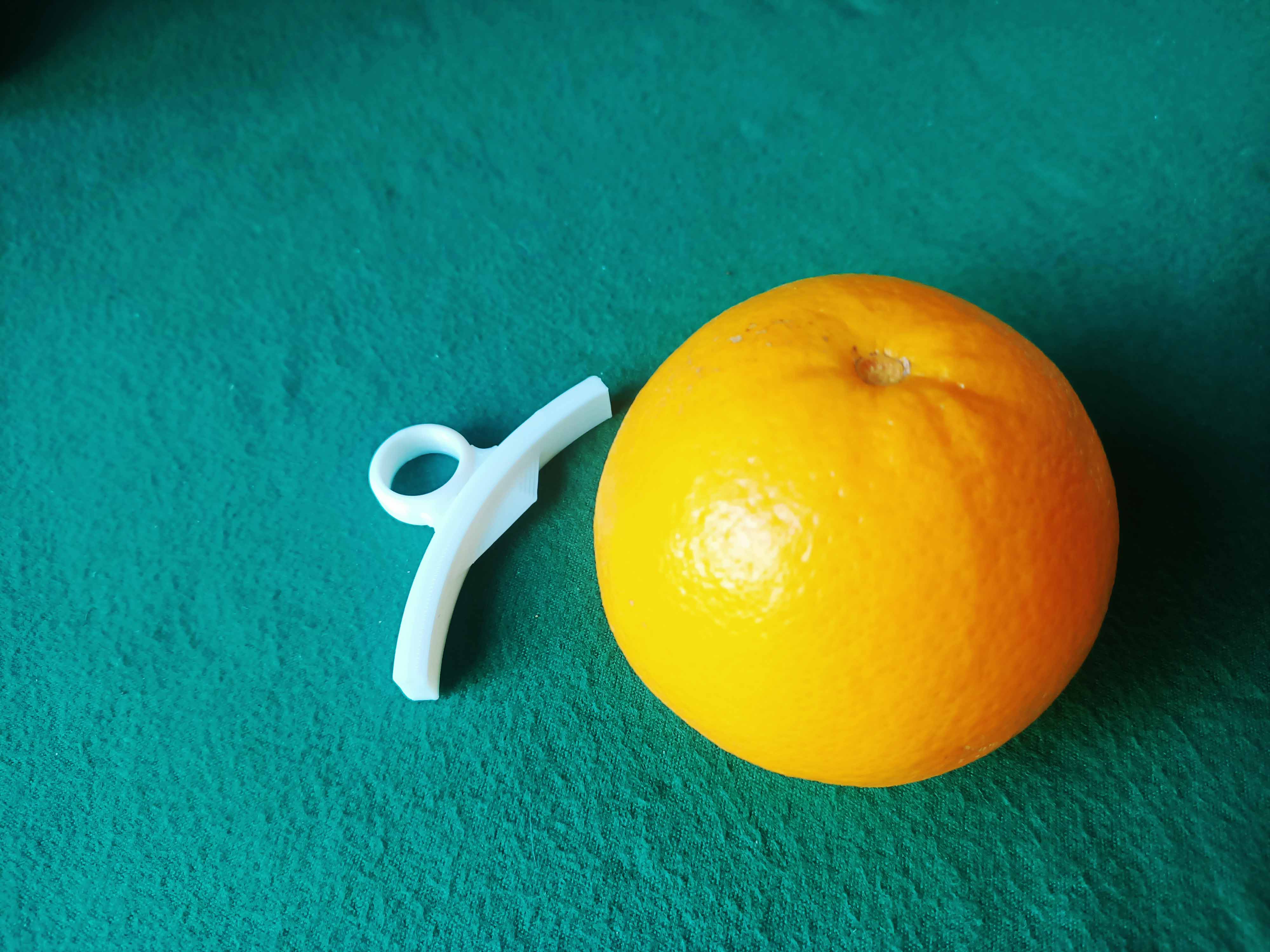 Hand Tool for peeling oranges