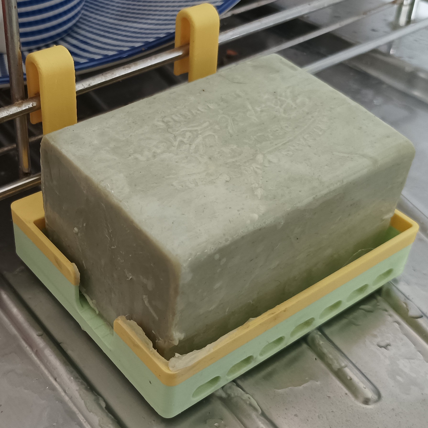 Porte-savon avec système de fixation modulaire