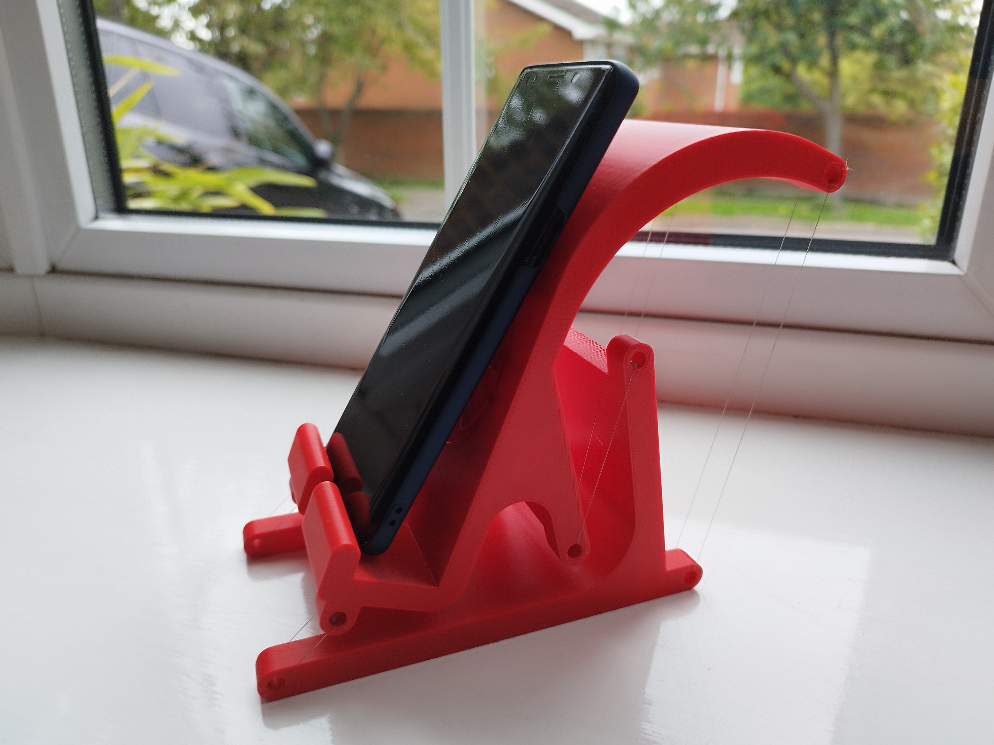Miniatura 2 do modelo 3D Floating Phone Holder
