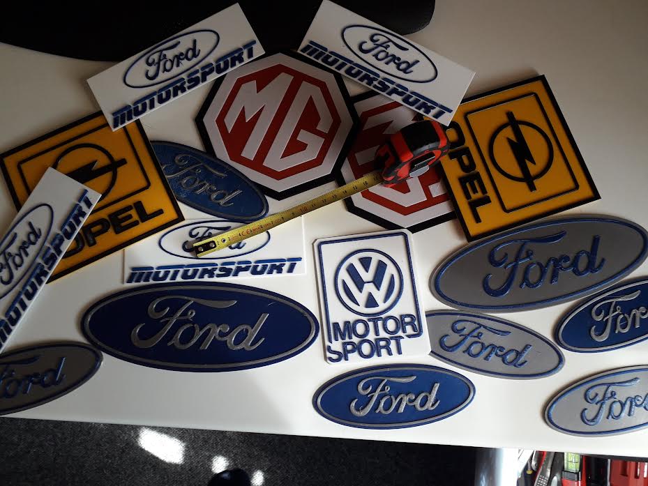 Various automakers signs / badges