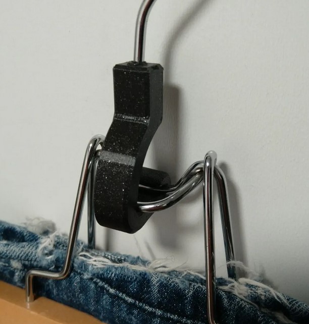 Trouser hanger replacement clamp