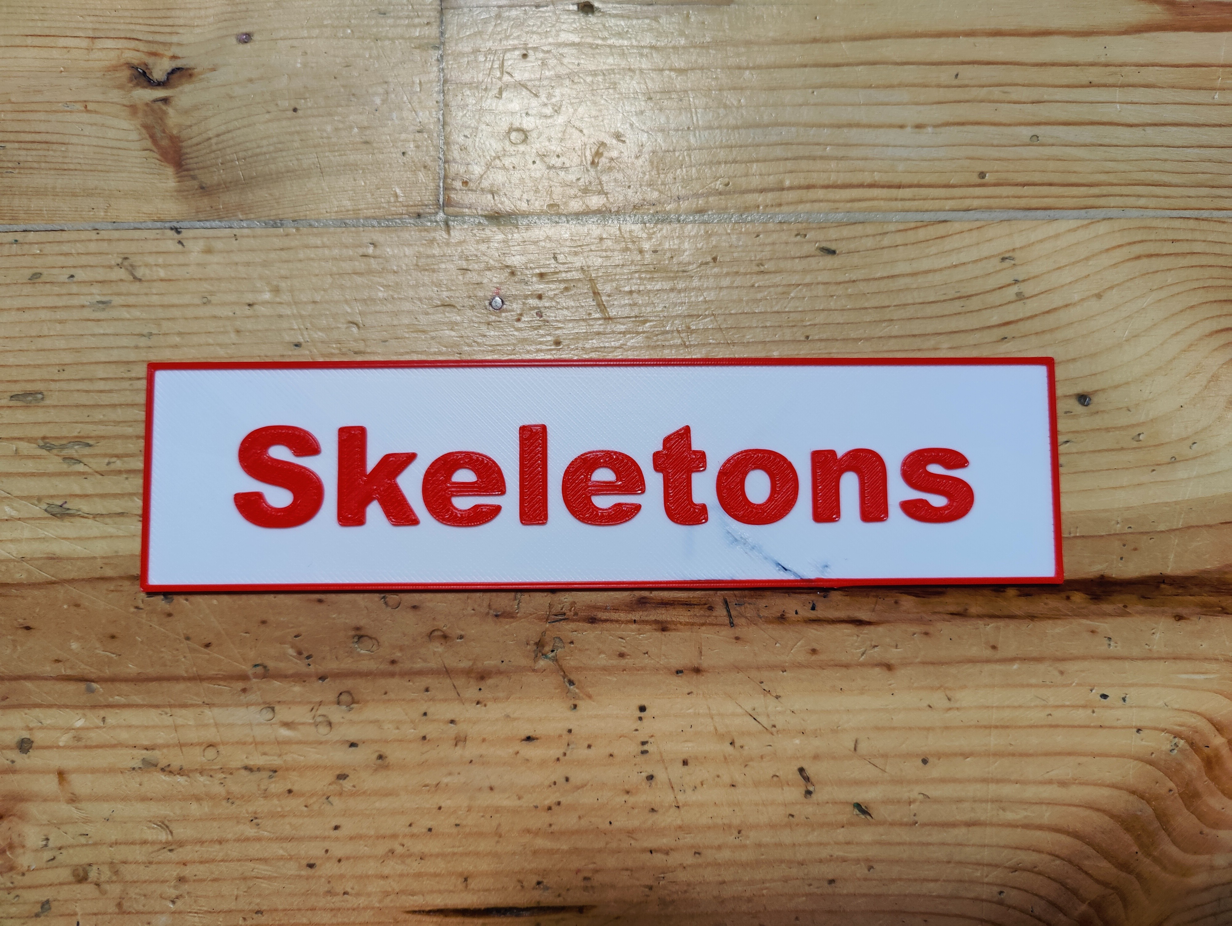 Skeletons Sign