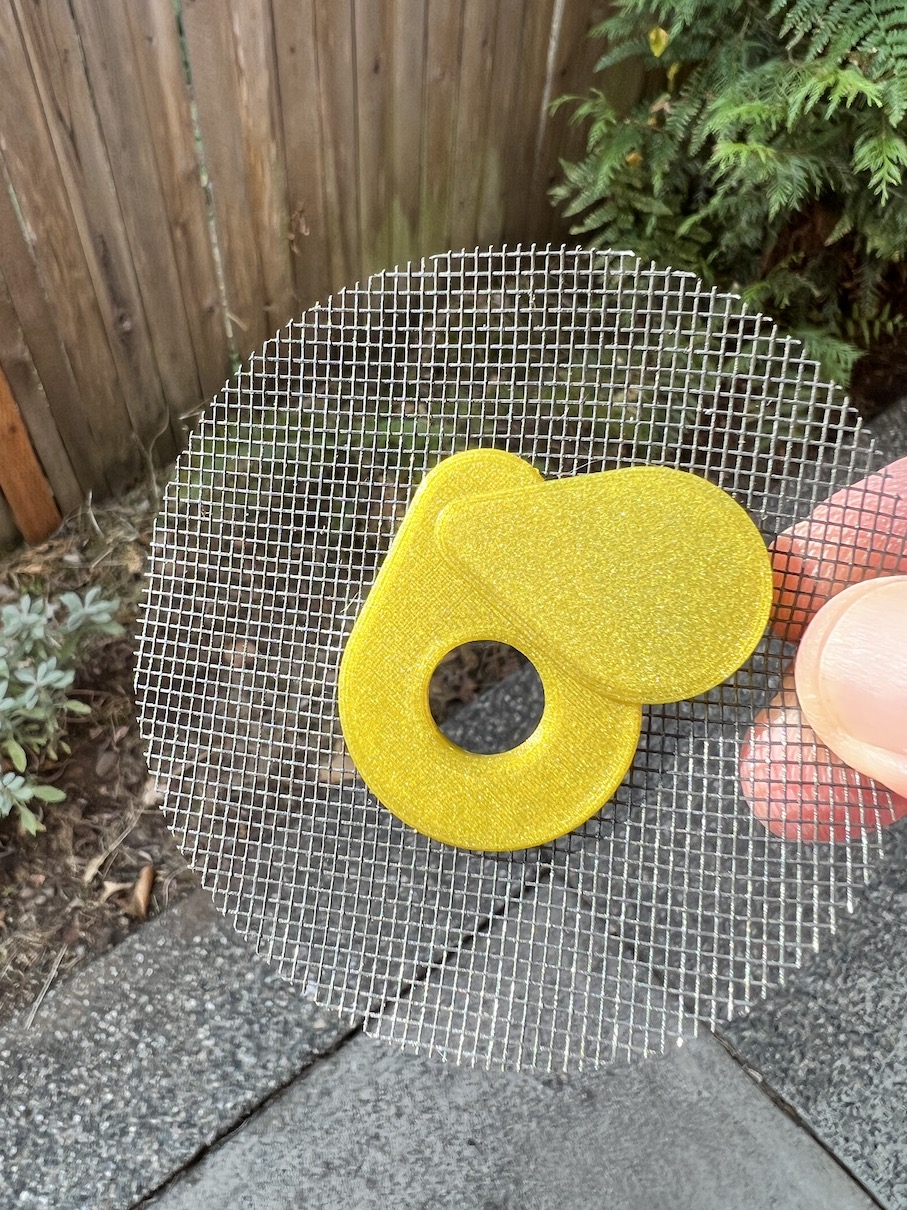 Window screen hole and grommet