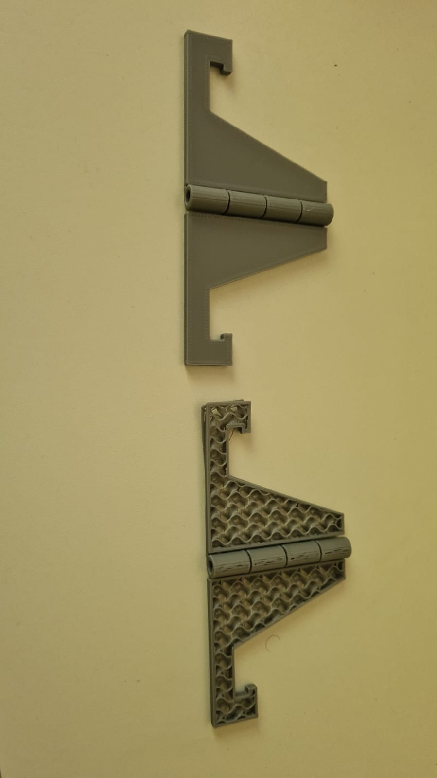 Folding phone stand, OpenSCAD based