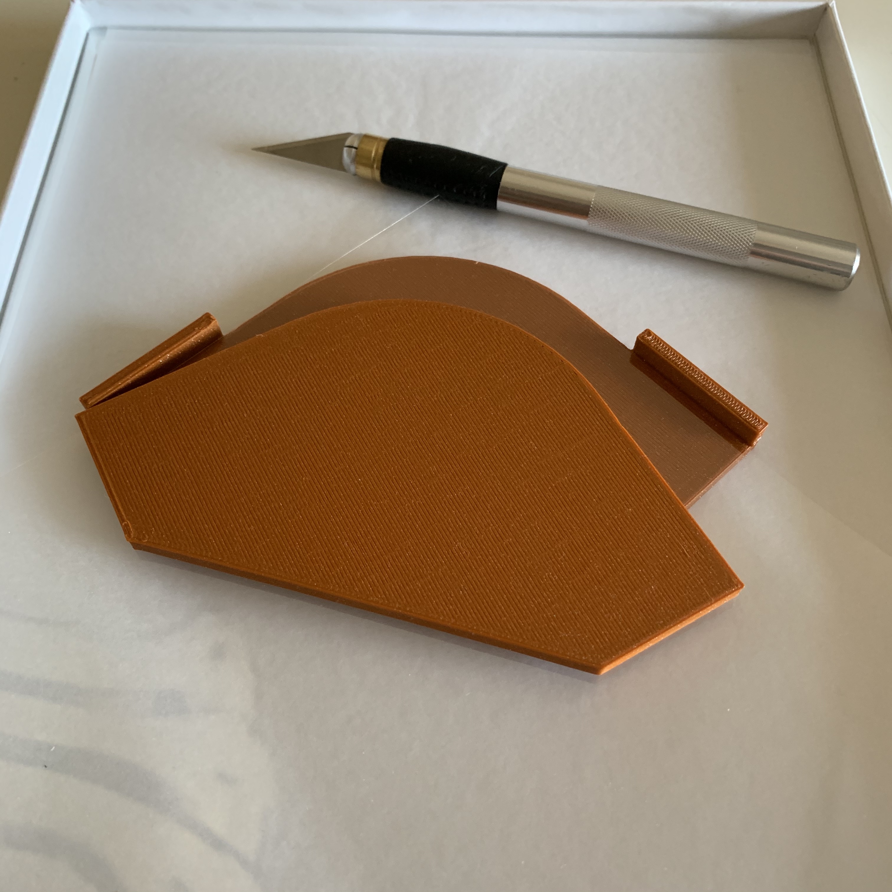 Form to cut shield corners