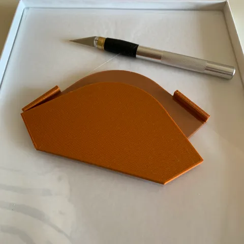 Form to cut shield corners