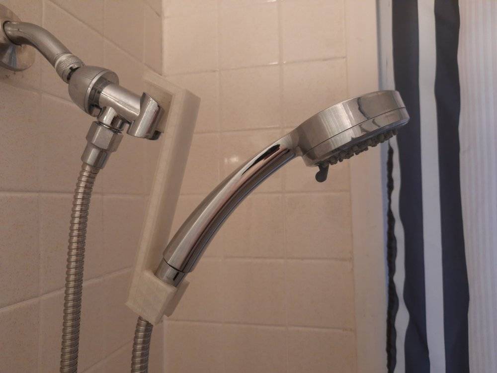 Shower head lowering extension.