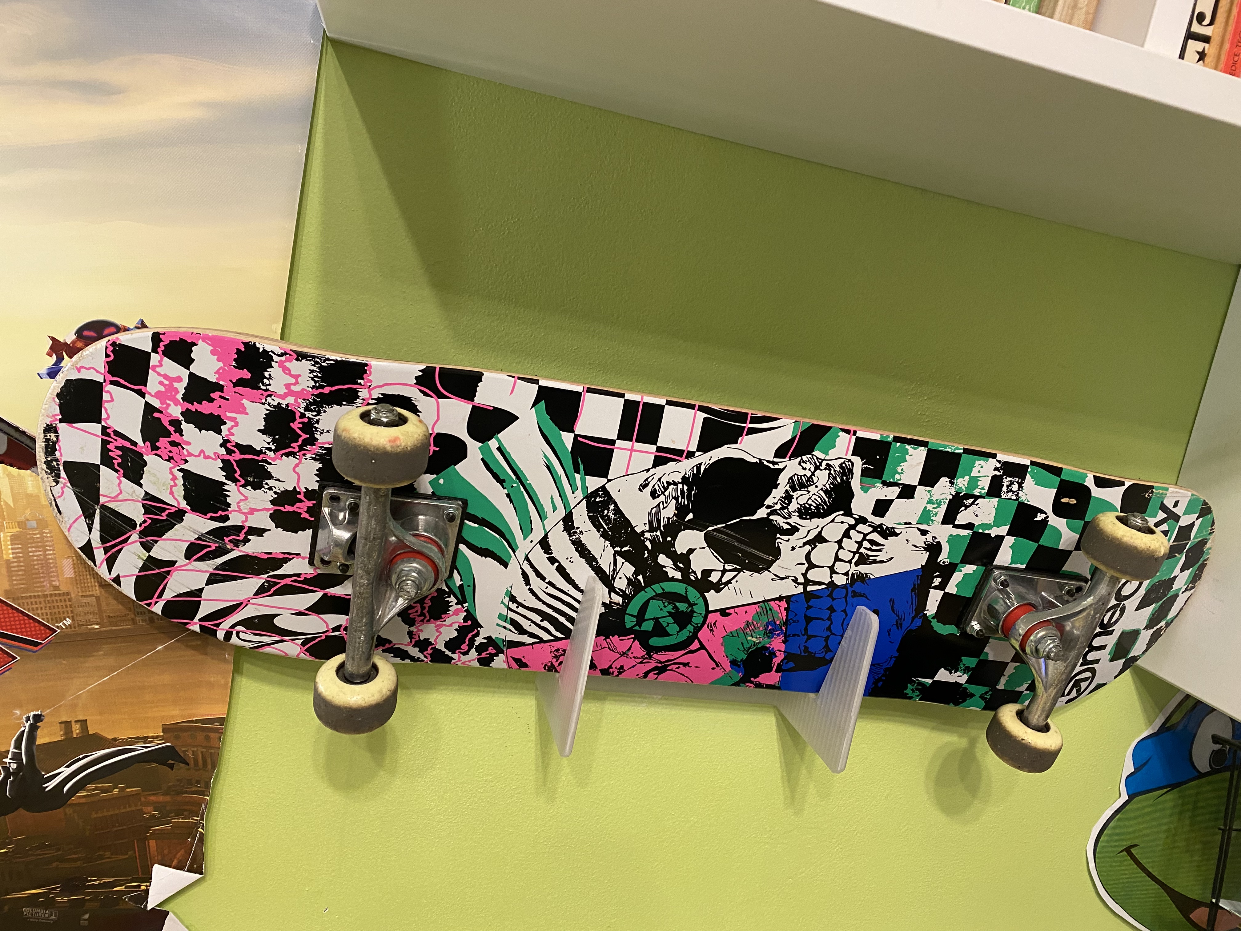 Skateboard wall holder