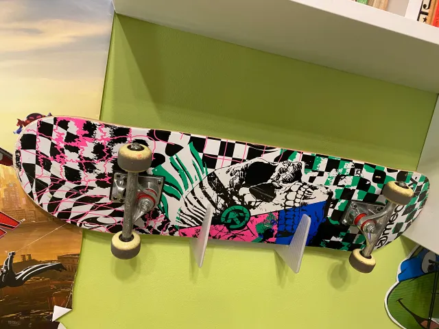 Skateboard wall holder