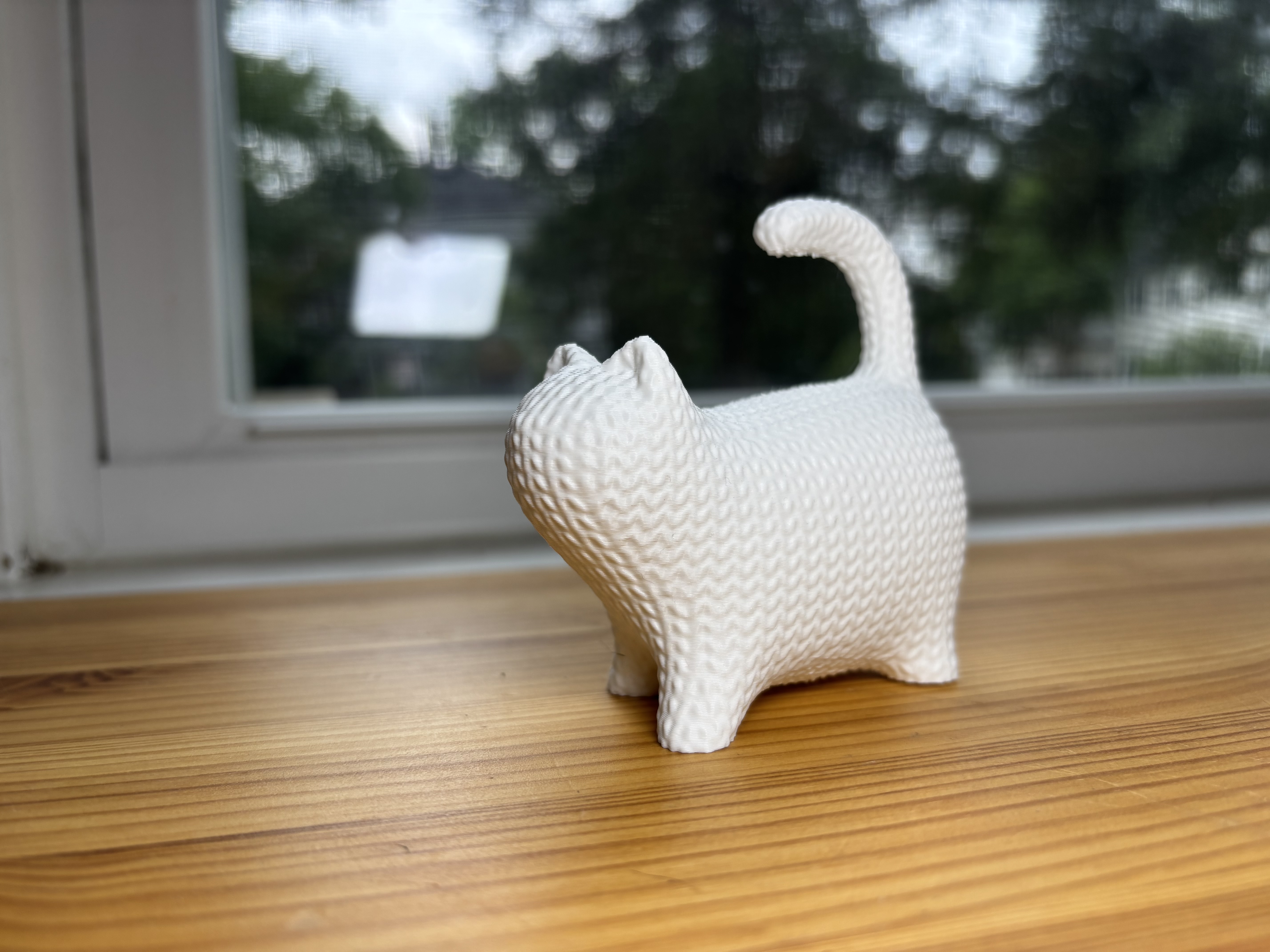 the cute knitted cat