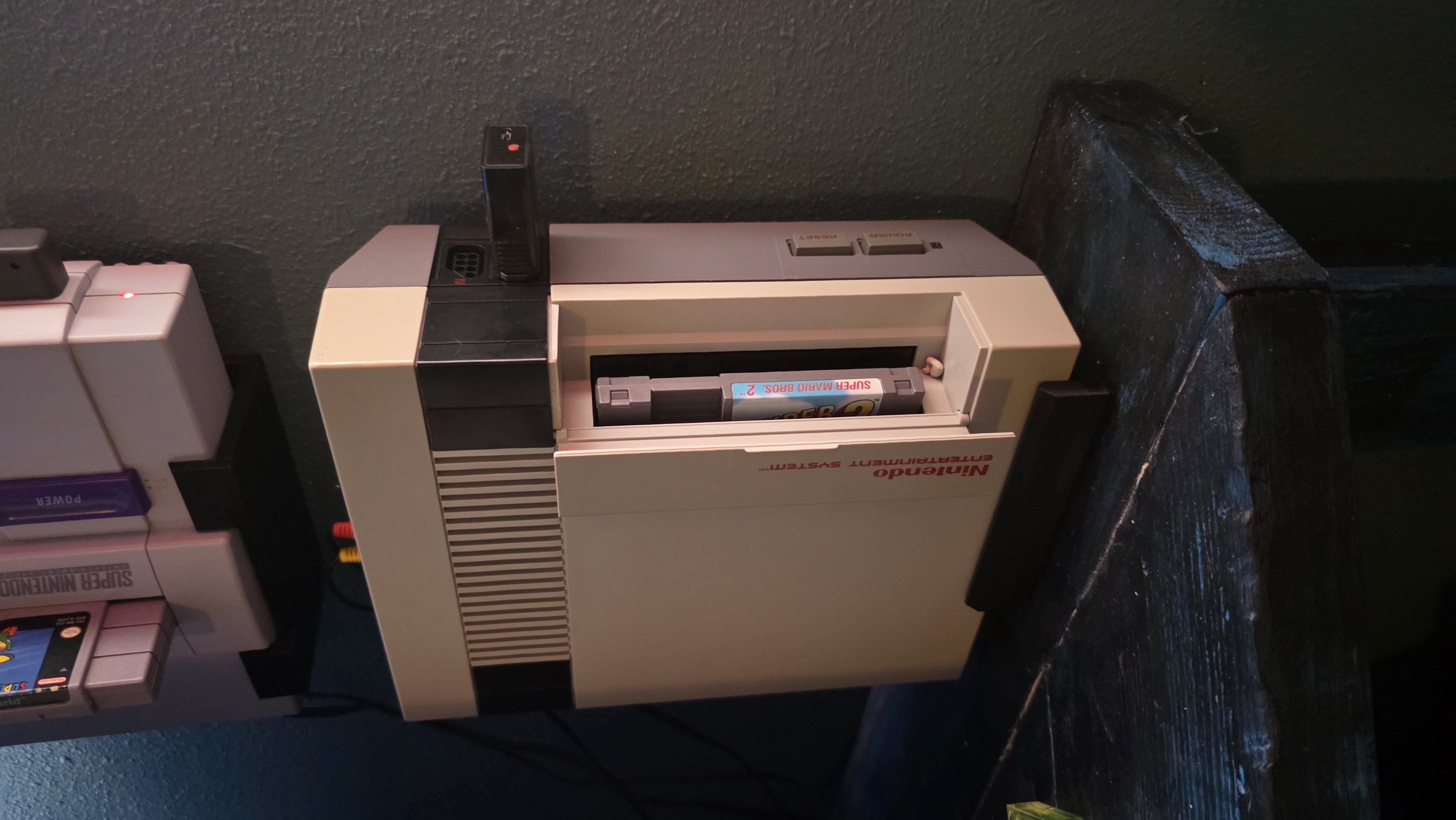 Vertical NES Stand – Dual-Side Orientation, Wall-Mountable & Support-Free