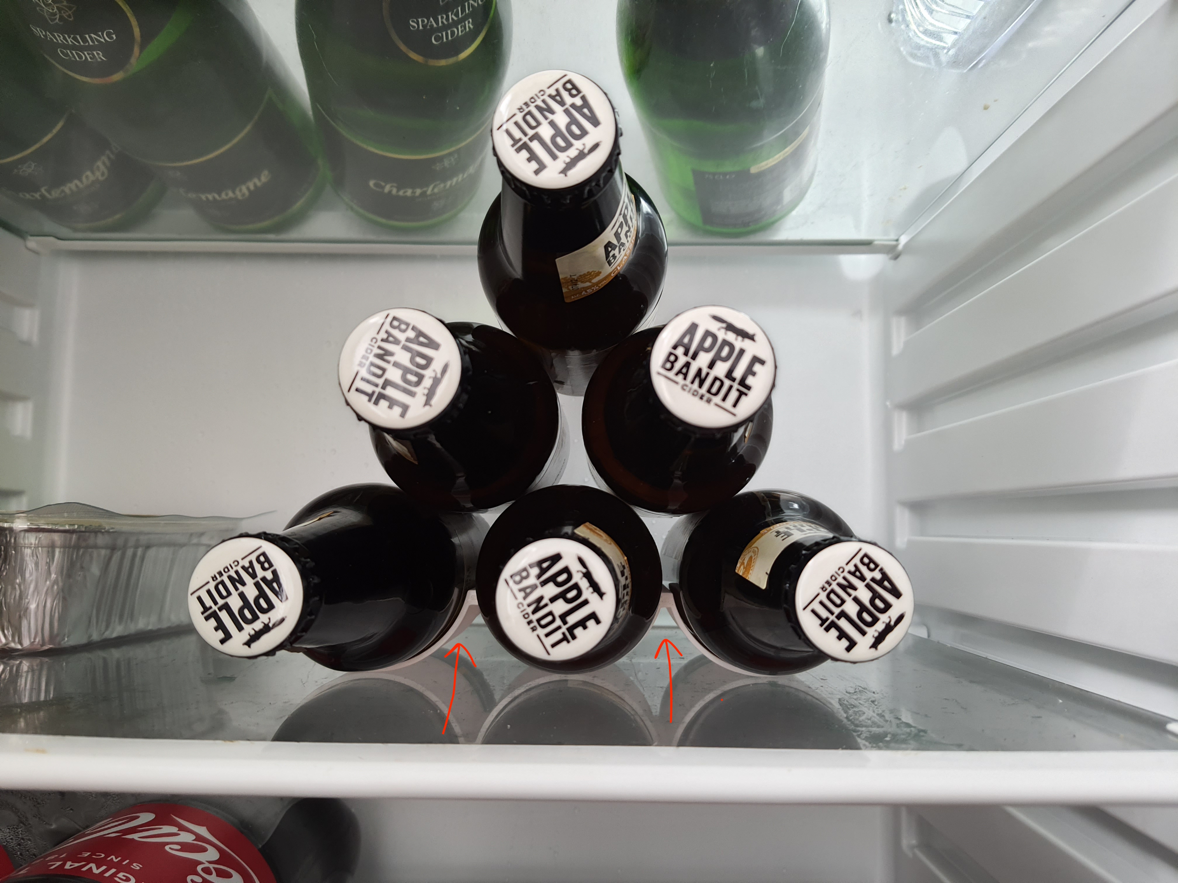 Bottle holder, stacking and anti-rolling