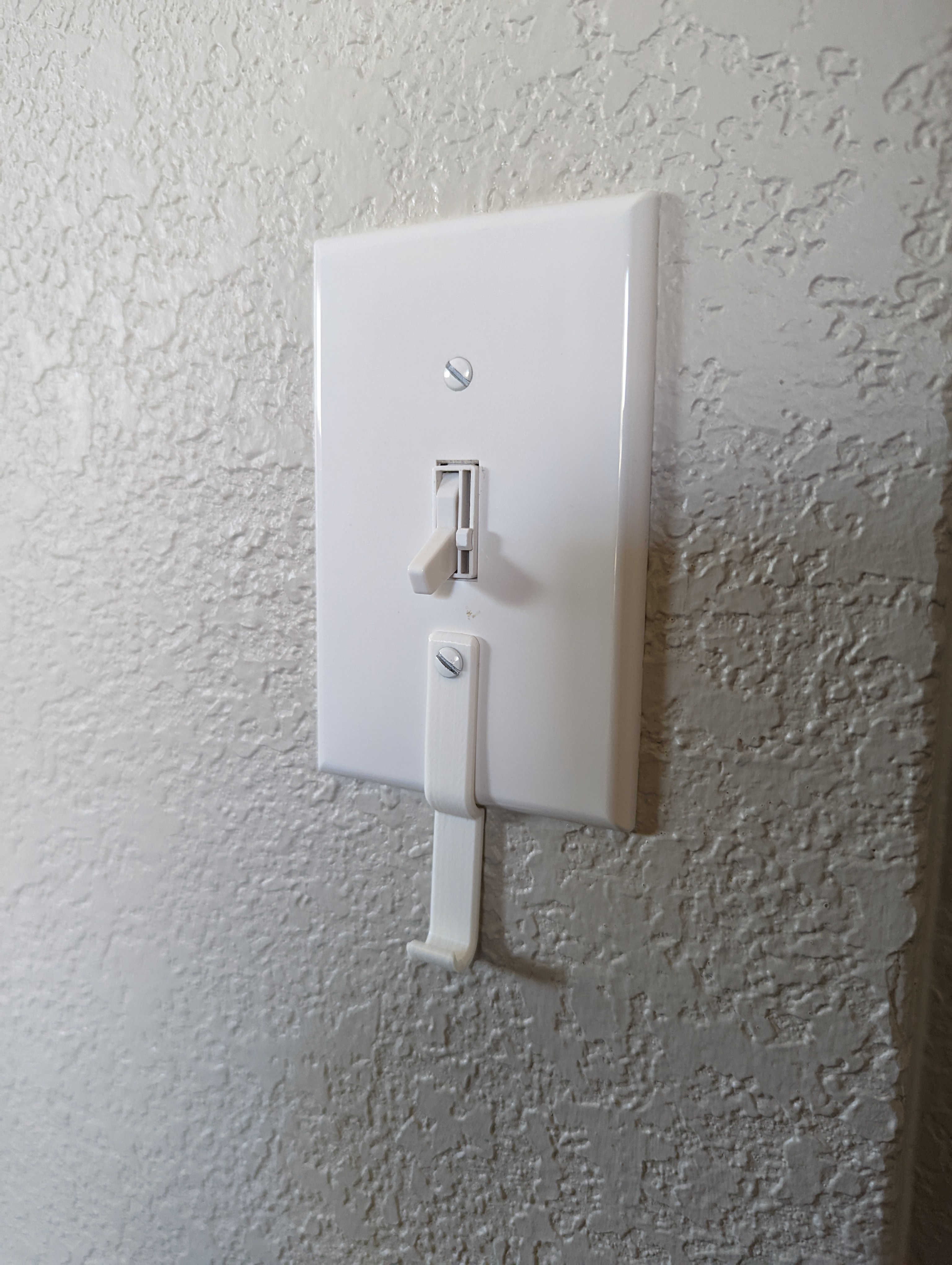 Light switch key hook