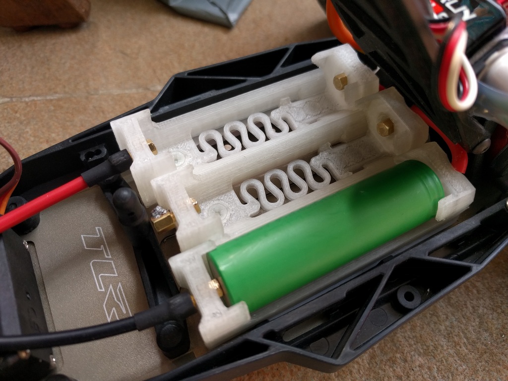 High current 18650/21700 holders with integrated spring