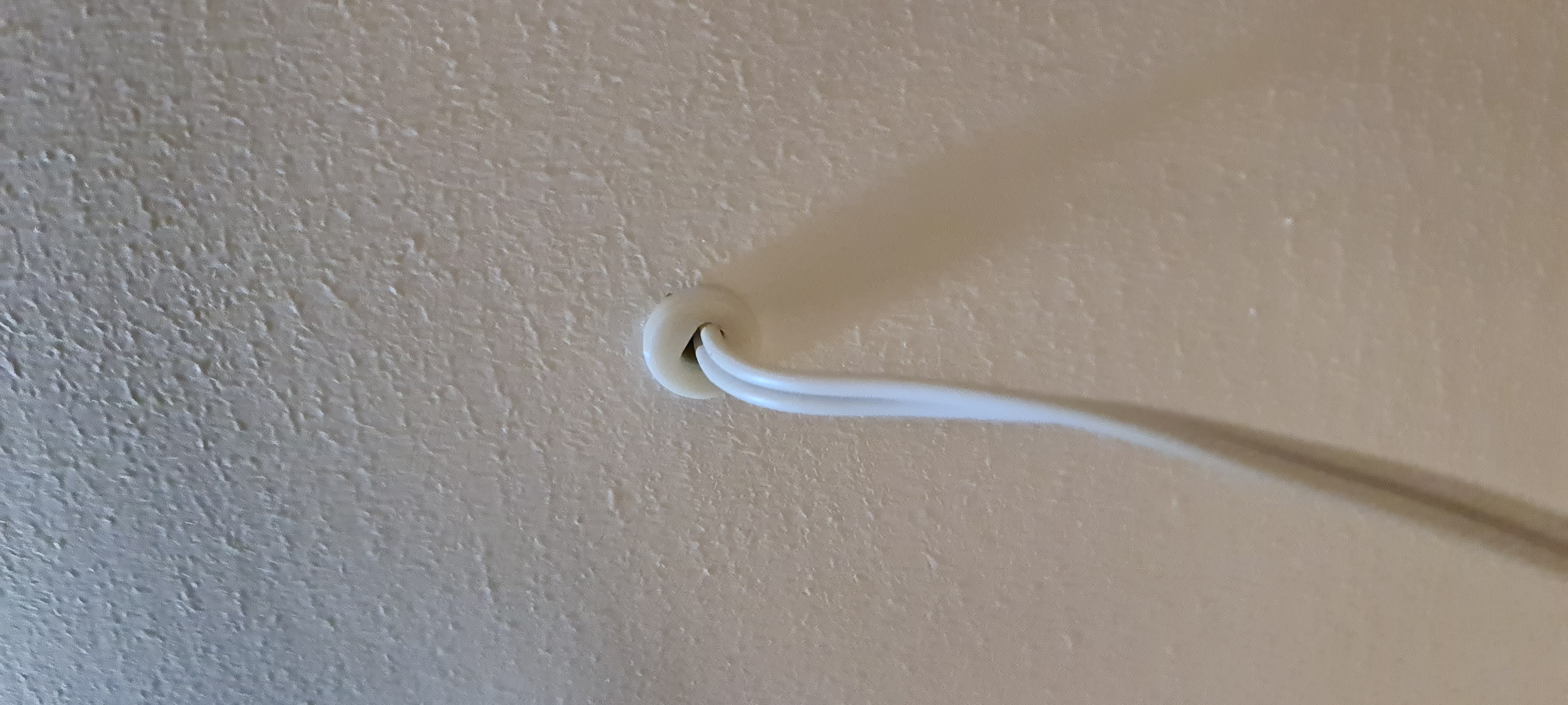 Drywall cable grommit