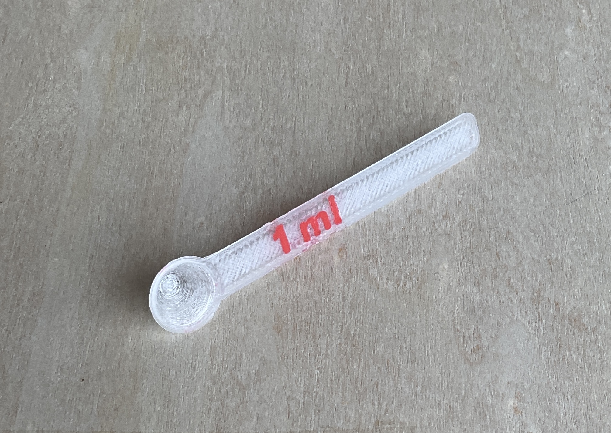 Measuring spoon with a 1 ml capacity, e.g. for mixing 2-component adhesives.