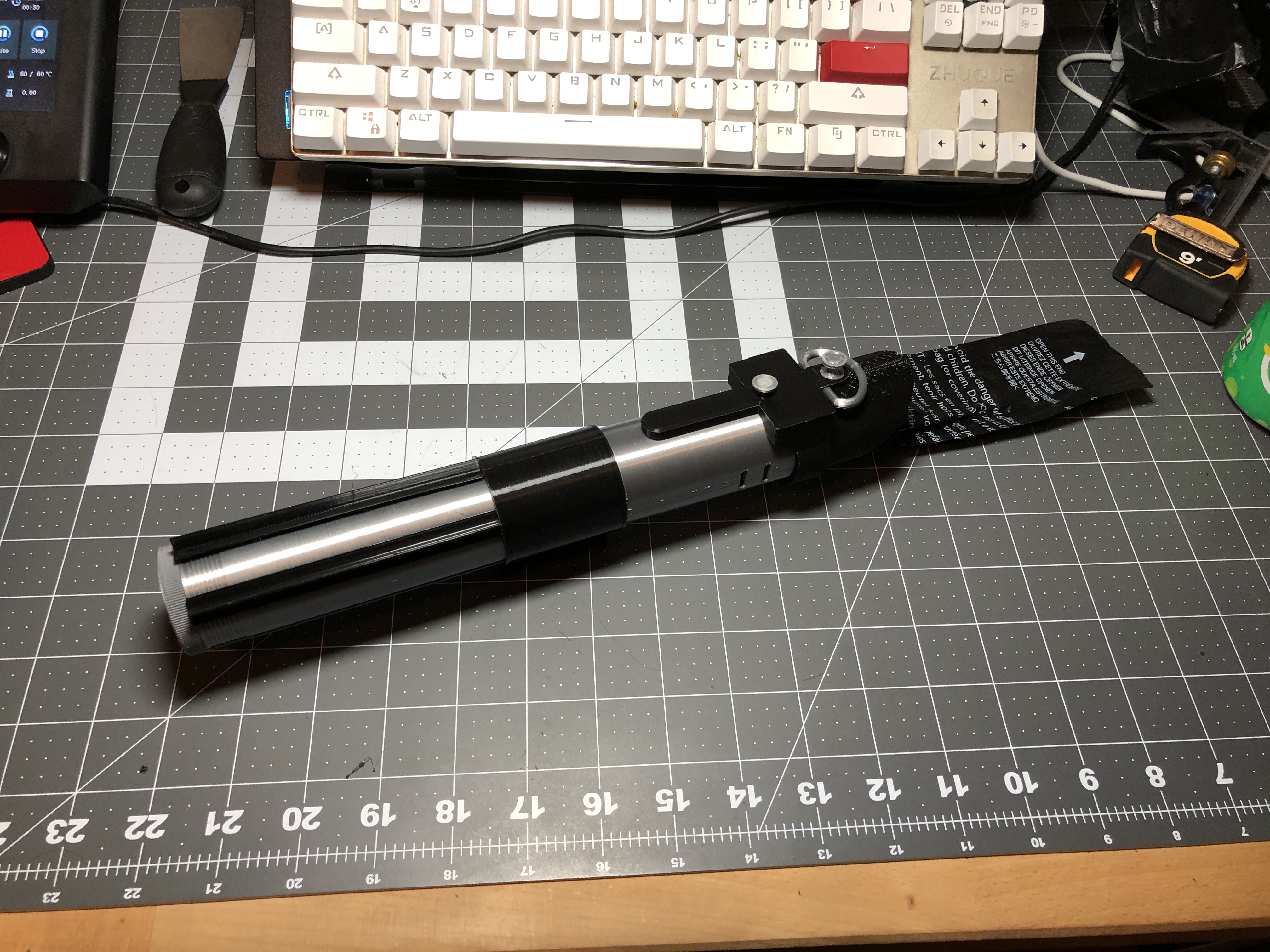 Shitesaber - Lightsaber with built in poop bag dispenser and storage