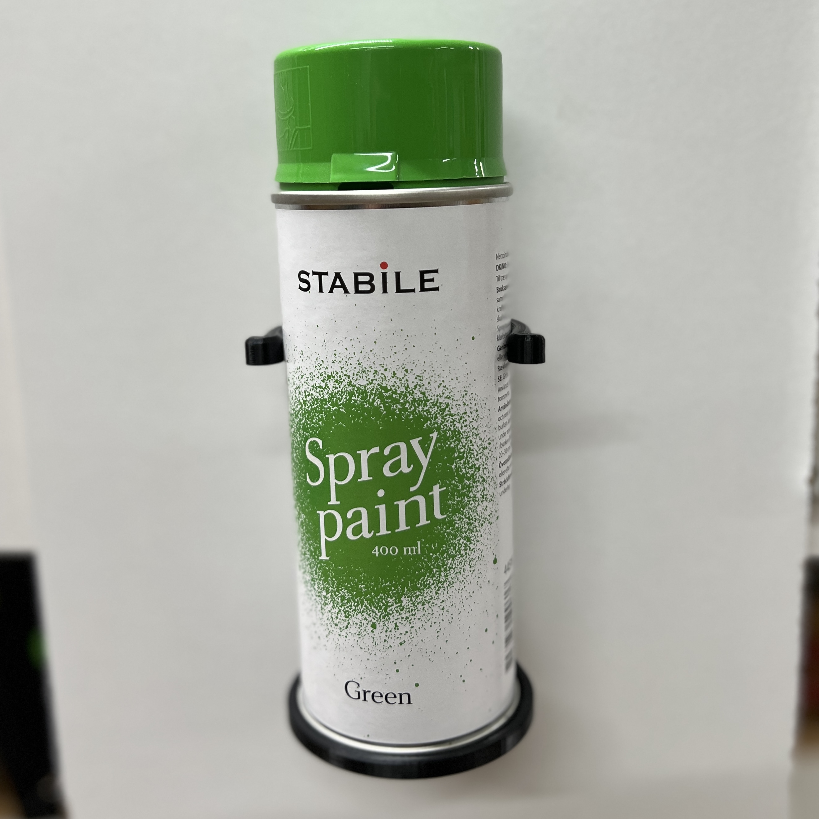 Holder for spraycans