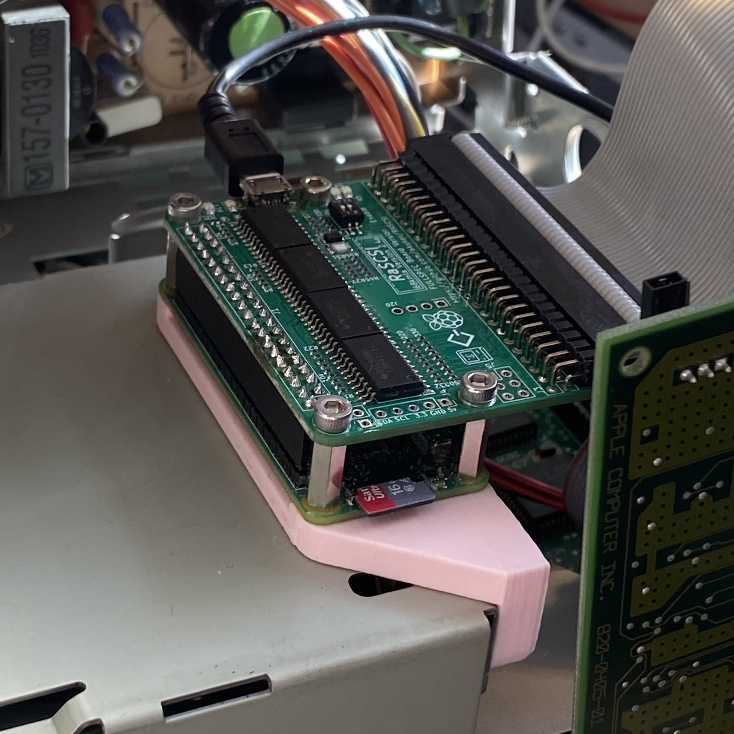 Macintosh Classic RASCSI internal mounting bracket.