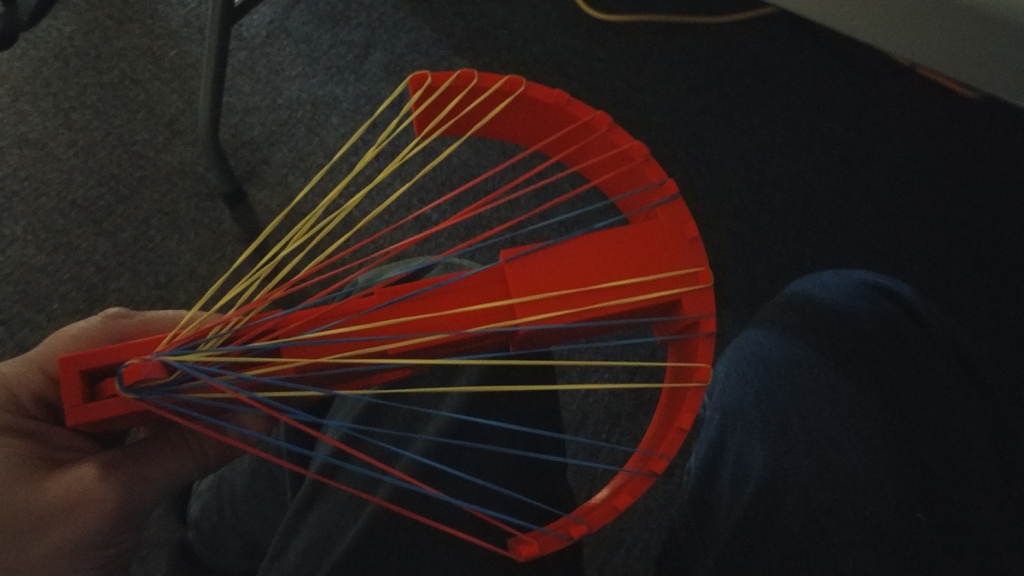 Bow attachment for rubber band gun