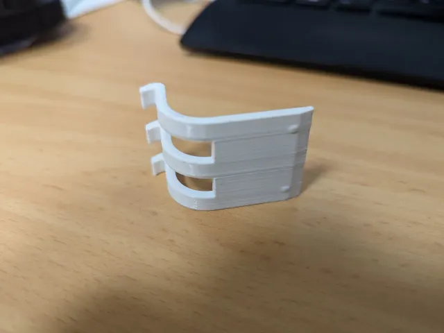 Lock hook for paper towel dispenser