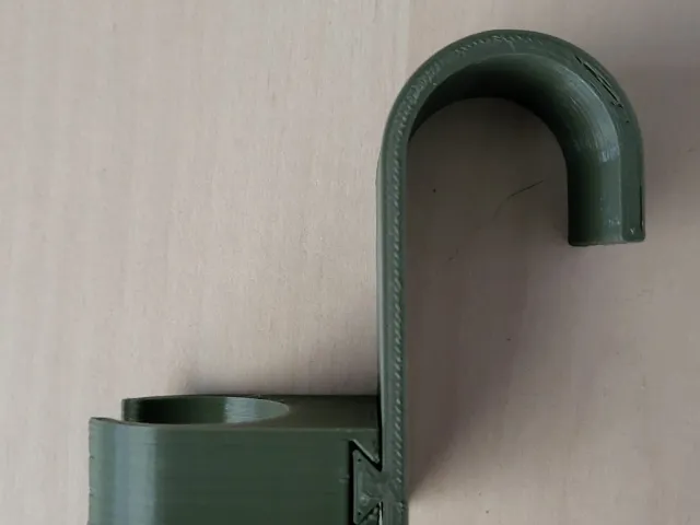 Mop or broom holder for radiator - bathroom