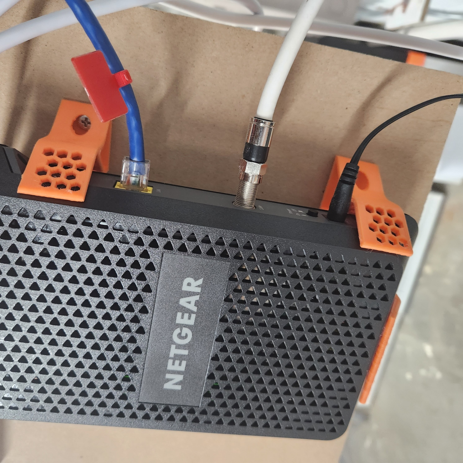 Netgear CM1000v2 Modem Wall Mount by Ed Yu Download free STL model