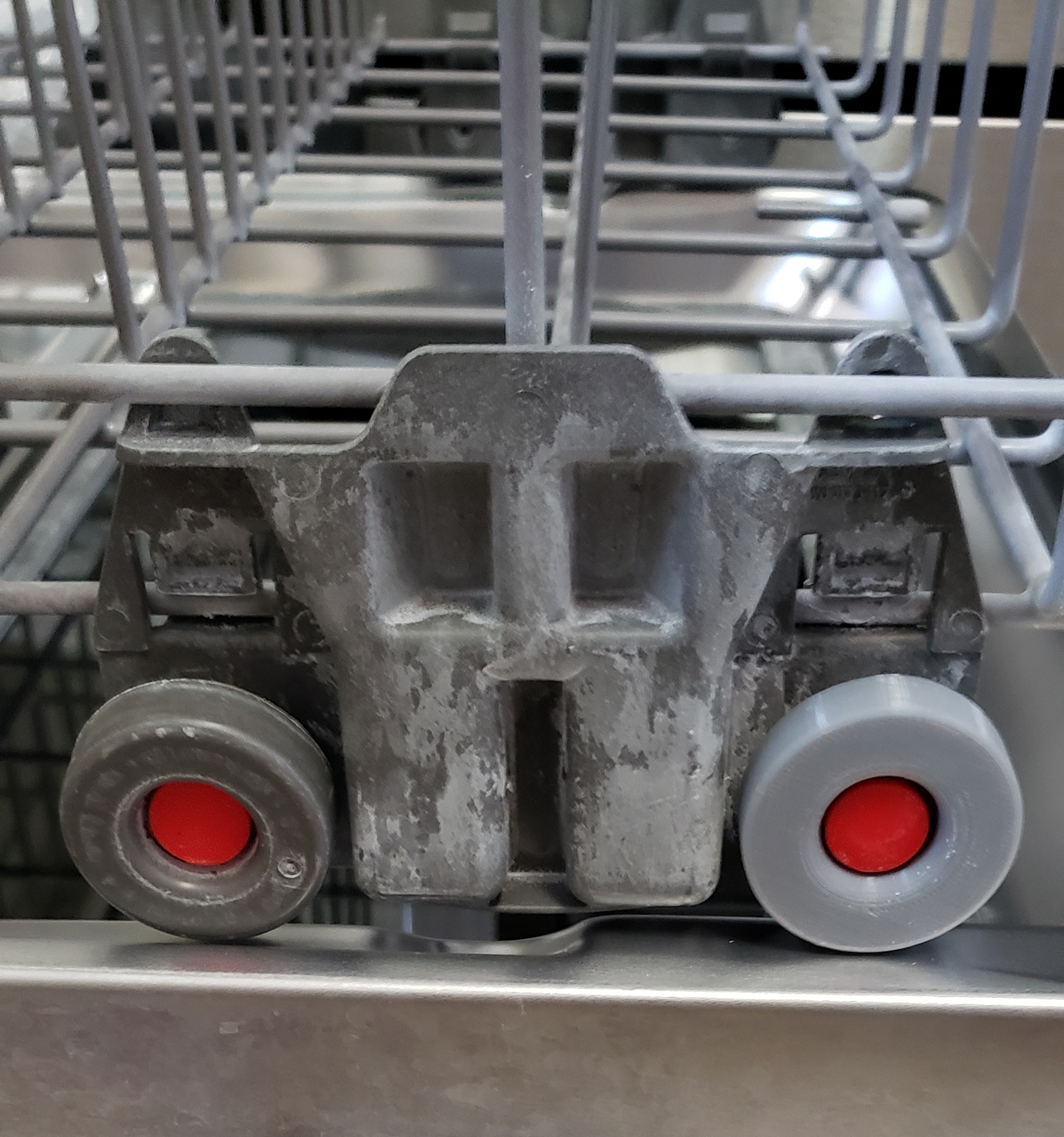 Dish washer tray wheel and axle