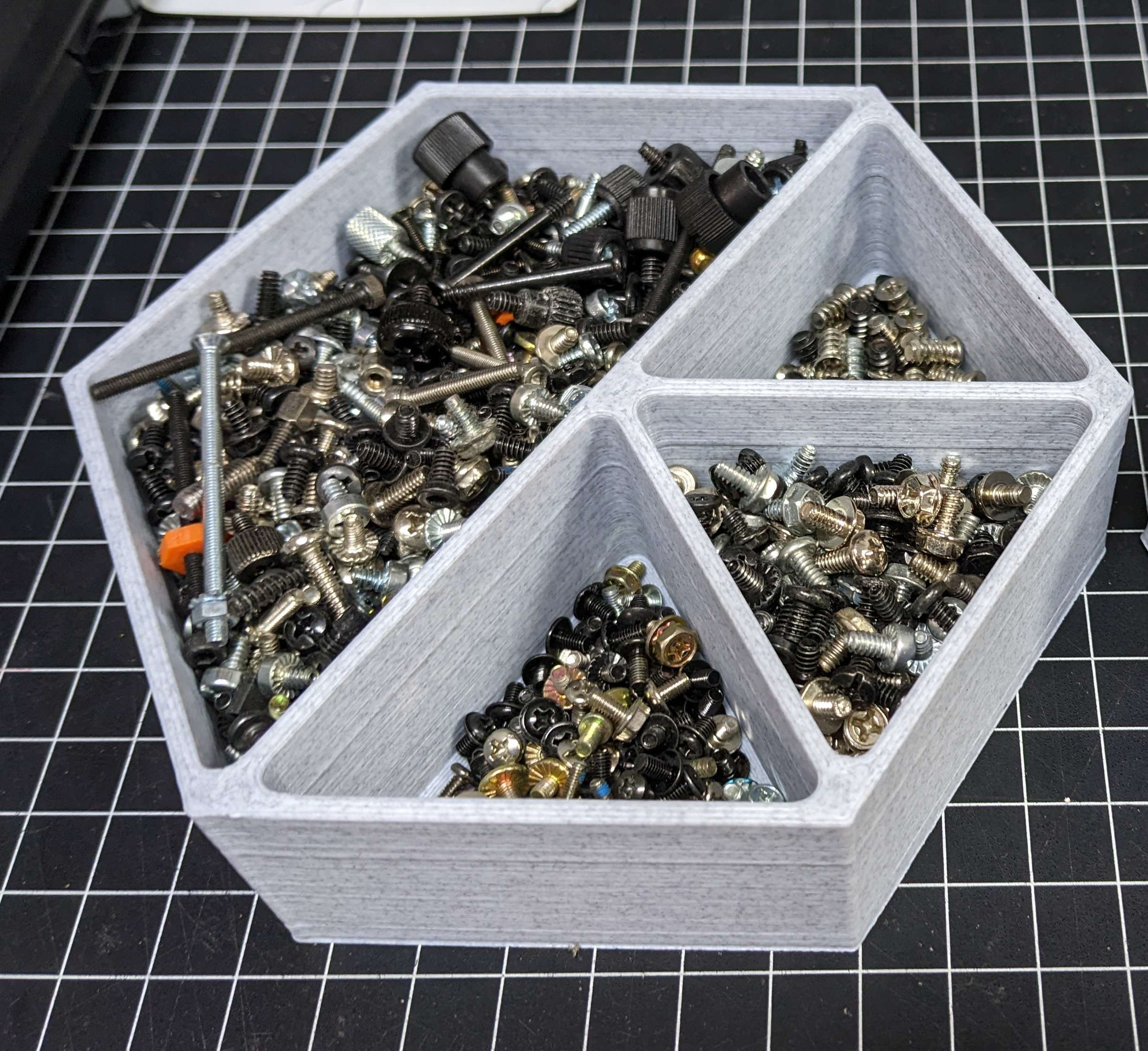 Partitioned screw container