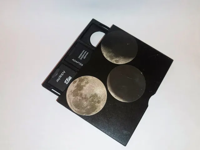 Flat SD card holder with double-sided slide.