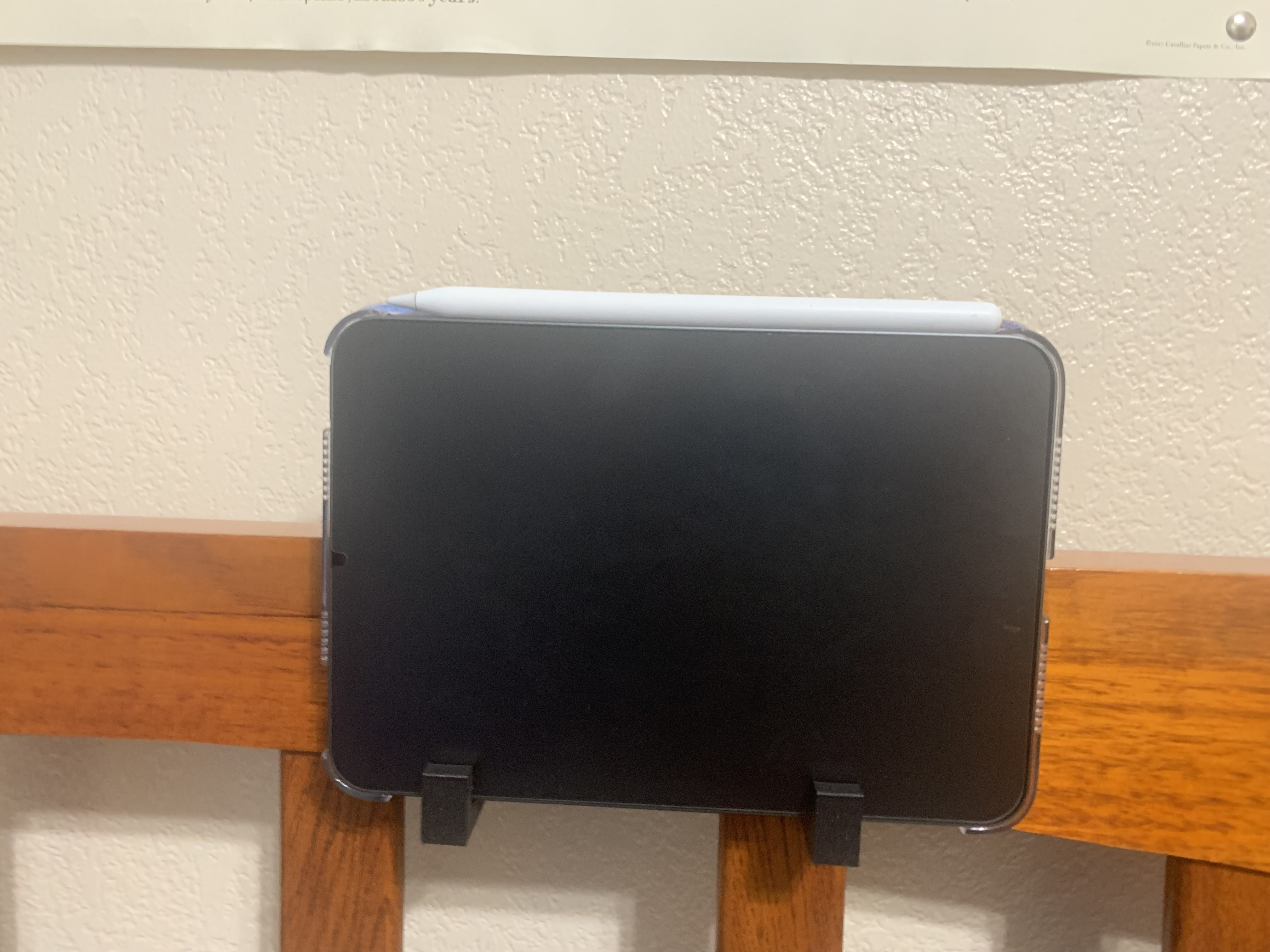 Bed frame tablet holder.