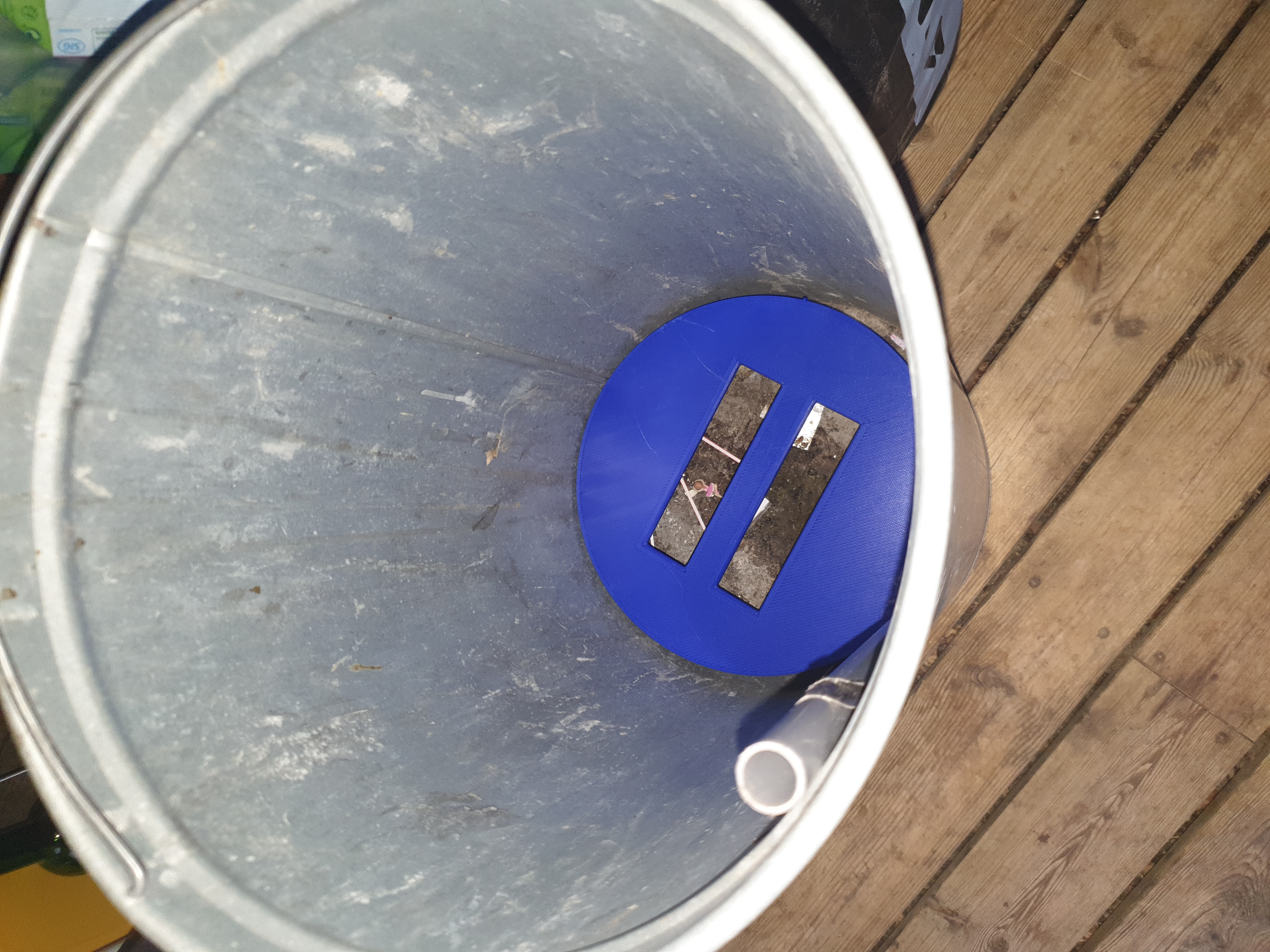 Trash can height reducer