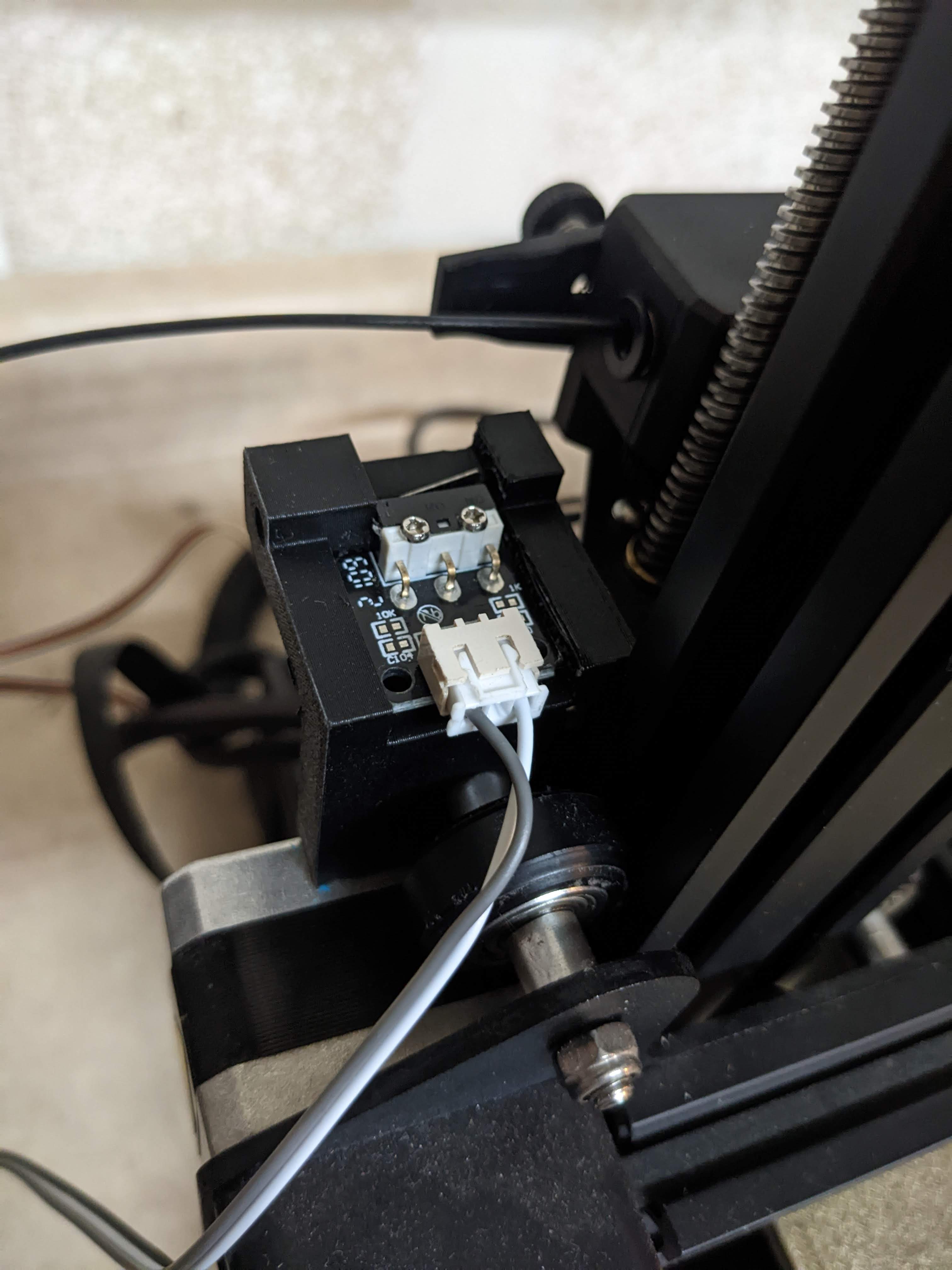 Ender 3v2 filament runout sensor by OZL01 Download free STL model