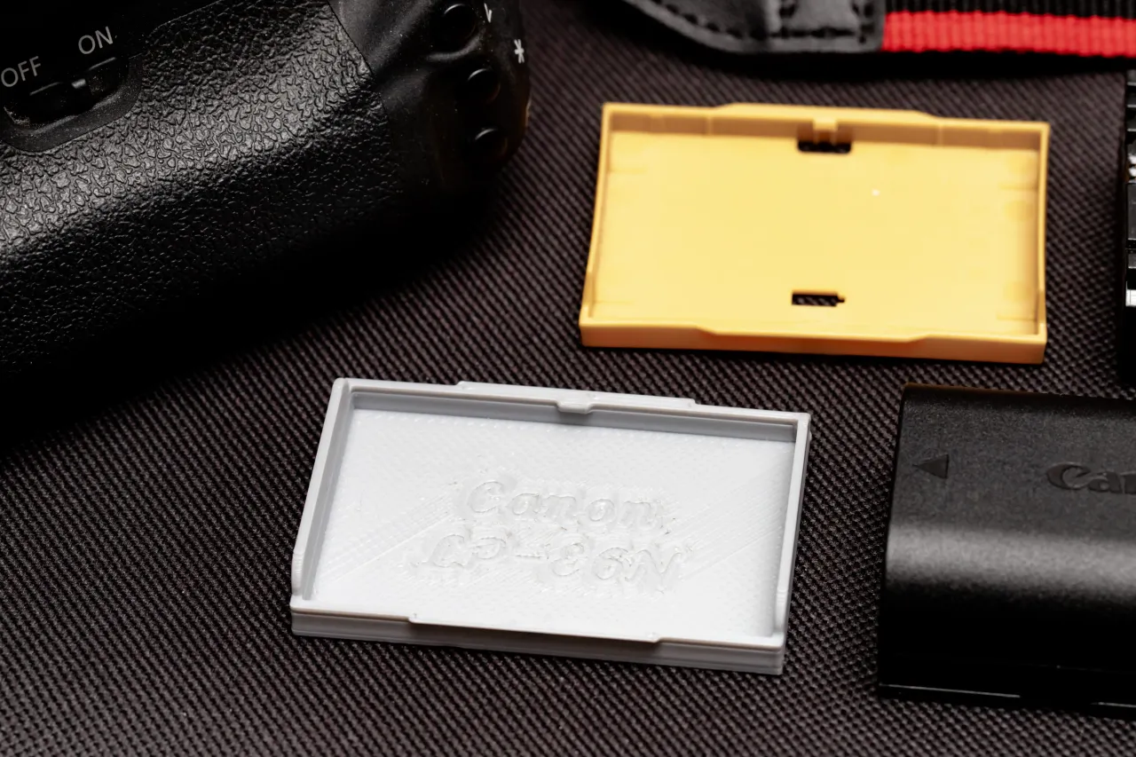 3D Printable Battery Cover for Canon LP-E4N and LP-E19 by Michael