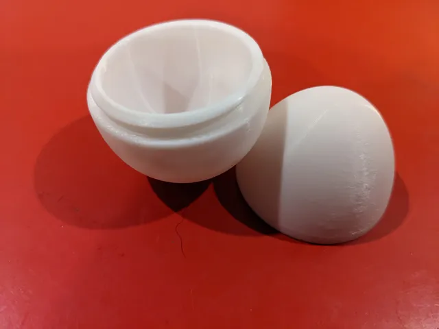 Unscrewable Egg With Hidden Compartment