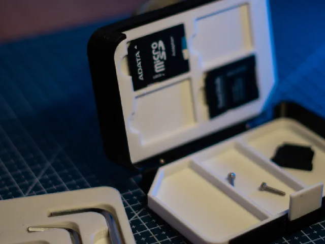 ModuBox – Modular Cage-Mount Storage (SD Cards & Tools)