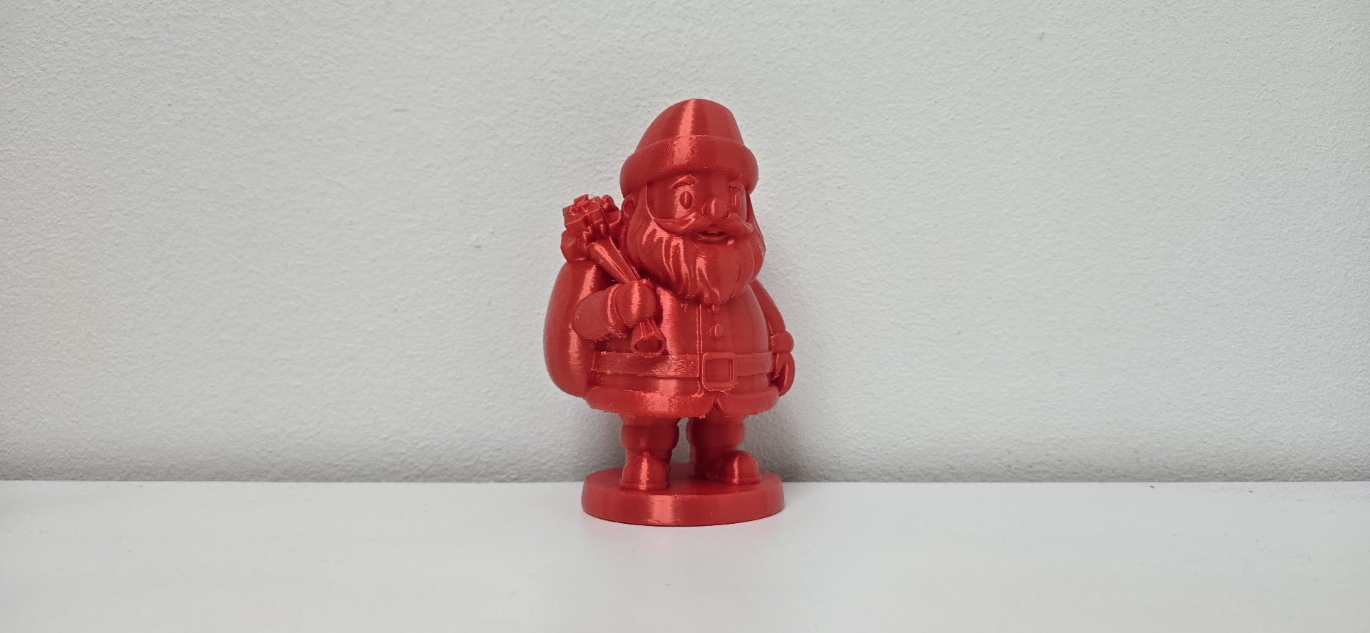 Santa Claus with Bag of Gifts Christmas Figurine