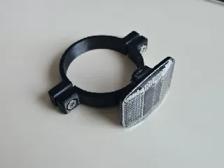 Front Reflector Clamp for a Bicycle Head Tube