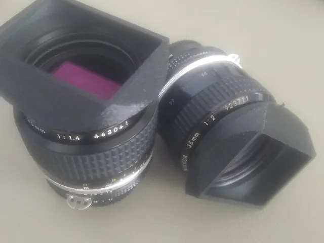 Slip on Compact hood+ Cover for 35mm prime lens.