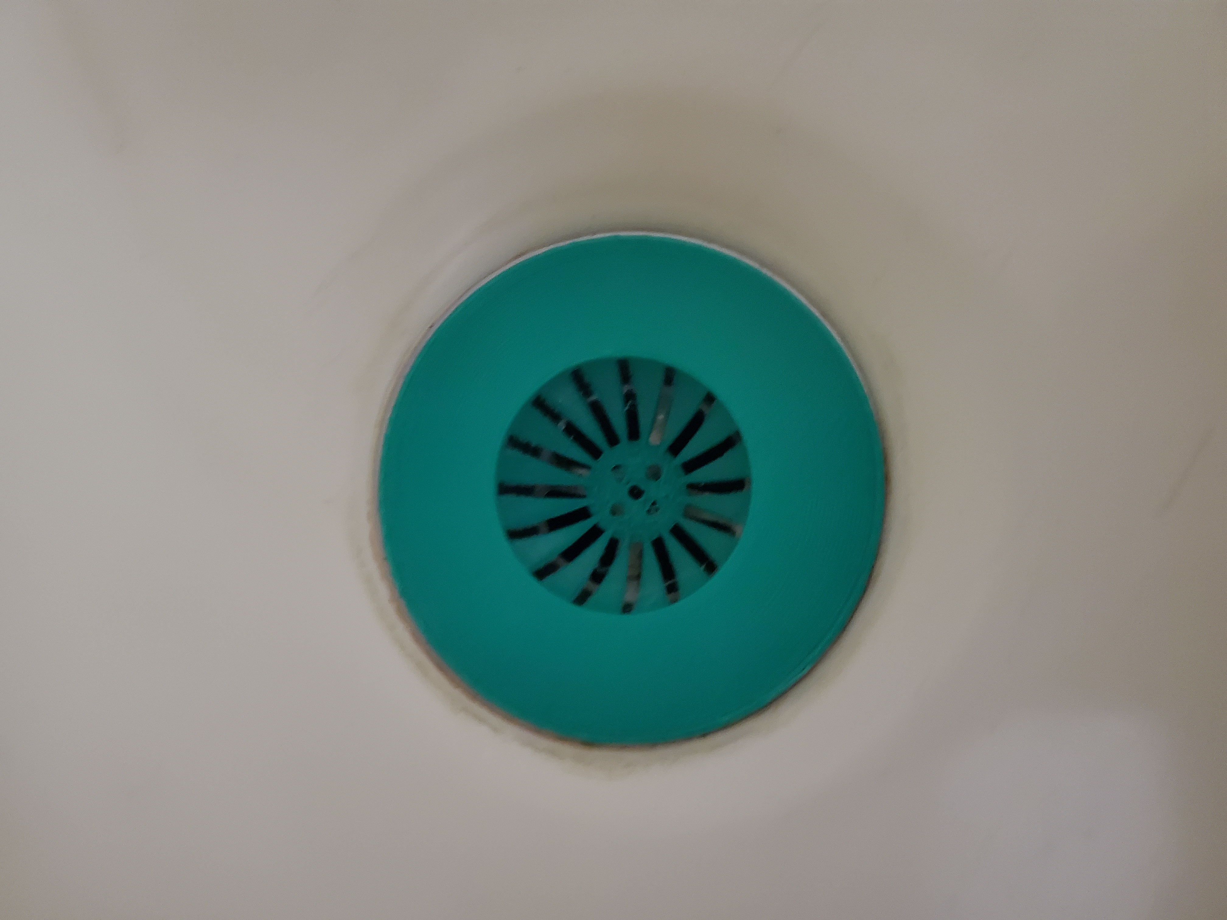 Bathtub drain hair strainer/hair catch