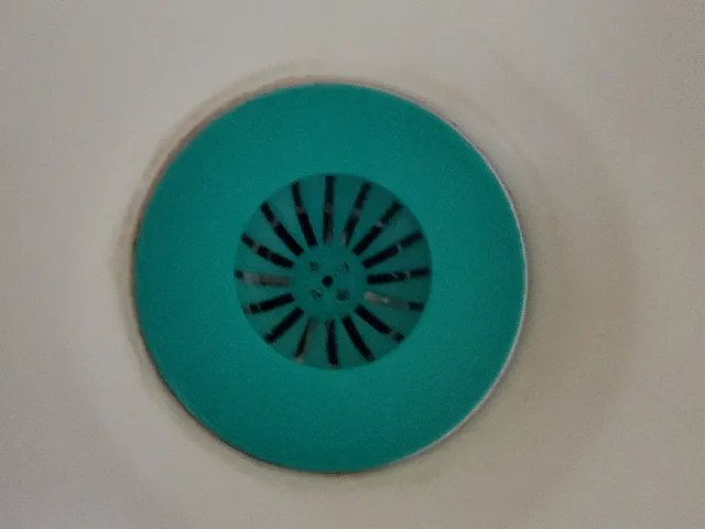 Bathtub drain hair strainer/hair catch