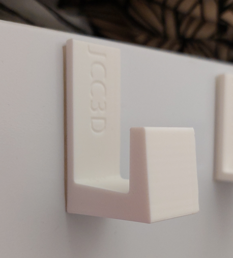 Self-adhesive wall hook