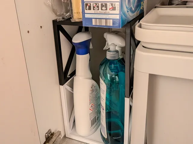 Cleaning supply shelf