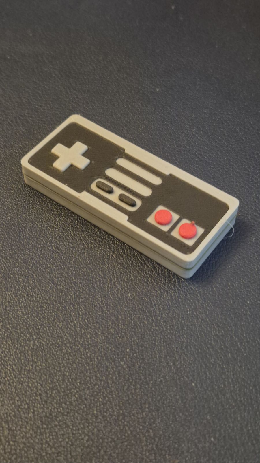 Miniatura 4 do modelo 3D NES controller fidget slider